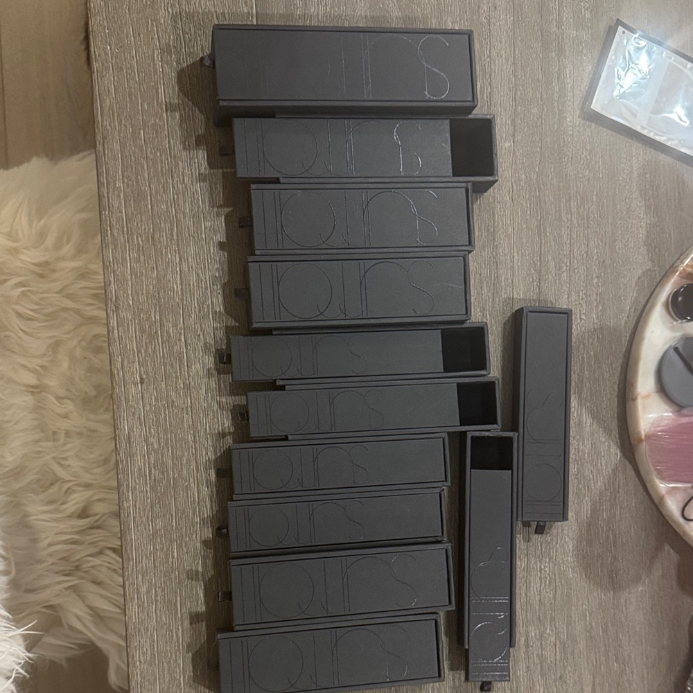 12 boxes from Surratt brushes brand new authentic. No brushes, just boxes